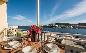 Bayview 2 Bedroom Seaview Apartment With Large Terrace With Panoramic Views - By Getawaysmalta